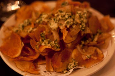 chips topped with blue cheese and sauteed onion