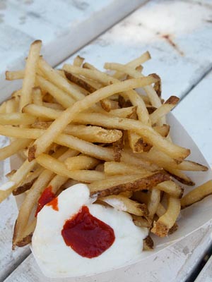 pommes frites with cucumber mayo and sriracha