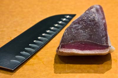 whole duck prosciutto with knife