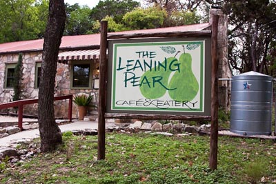 leaning pear sign