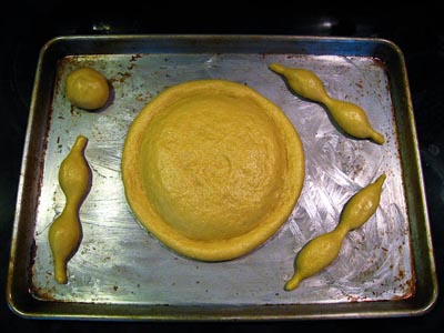 shaped dough pieces on baking sheet