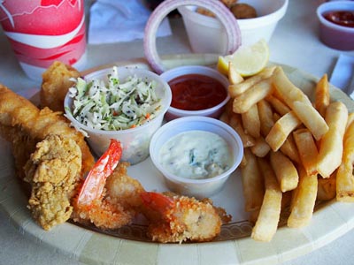 seafood plate: oysters, fish, shrimp, cole slaw