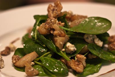spinach salad with candied walnuts, roasted pears, and balsamic vinaigrette