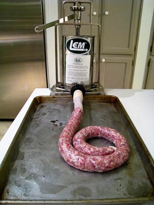sausage being stuffed into casings
